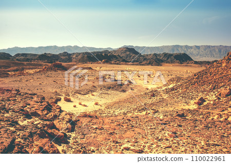 View of the desert. View of the valley with mountains on the backdrop. Timna Park, Eilat, Israel View of the desert. View of the valley with mountains on the backdrop. Timna Park, Eilat, Israel 110022961