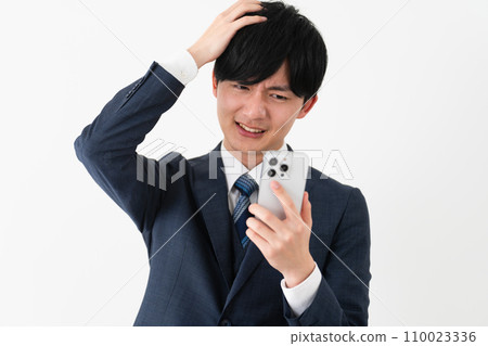 Young man wearing a business suit Business image 110023336