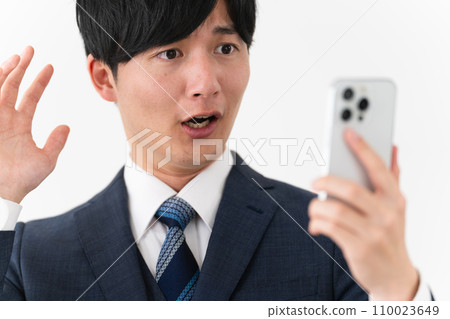 Young man wearing a business suit Business image 110023649
