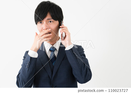 Young man wearing a business suit Business image 110023727