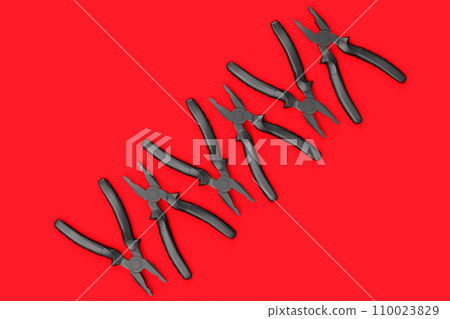Set of monochrome hand tool pliers for repair and installation on red background Set of monochrome hand tool pliers for repair and installation on red background 110023829