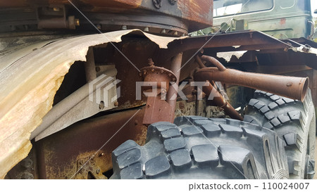 Destroyed Russian military equipment, destroyed armored car. War in Ukraine. Fragment of a rusty burnt car. Salon armored car armored personnel carrier. Remains of military equipment 110024007