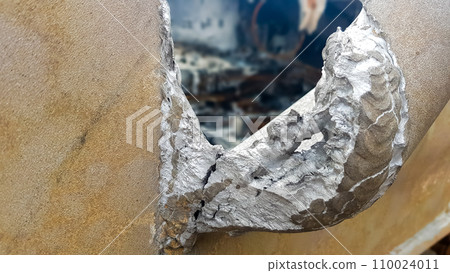 Destroyed Russian military equipment, destroyed armored car. War in Ukraine. Fragment of a rusty burnt car. Salon armored car armored personnel carrier. Remains of military equipment 110024011