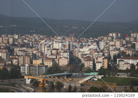 The view from the skyscraper window to the Asian part of Istanbul. City development. On the horizon of mountains and hills. The view from the skyscraper window to the Asian part of Istanbul. City development. On the horizon of mountains and hills. 110024189