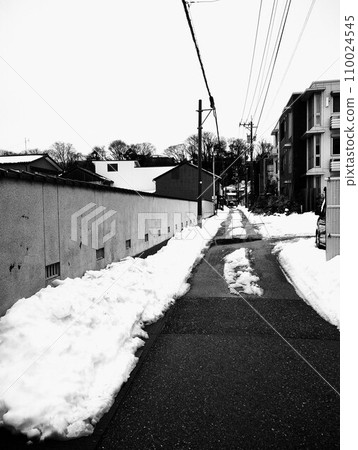 Snow-covered road  110024545