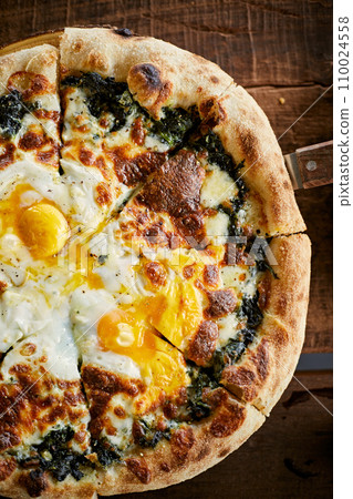 Homemade pizza spinach cheese 110024558