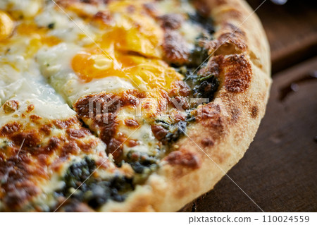 Homemade pizza spinach cheese 110024559