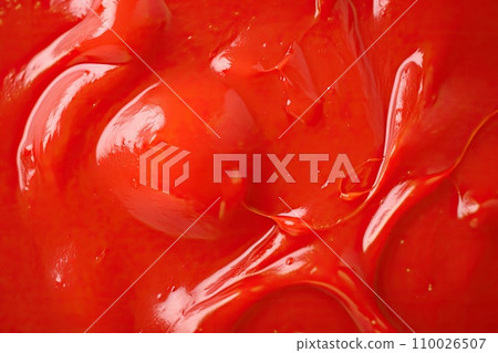 Macro texture of red ketchup. Tomato sauce background Macro texture of red ketchup. Tomato sauce background 110026507