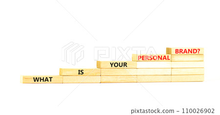 What is your personal brand symbol. Concept words What is your personal brand on wooden blocks stairs. Beautiful white table white background. Business, what is your personal brand concept. Copy space 110026902