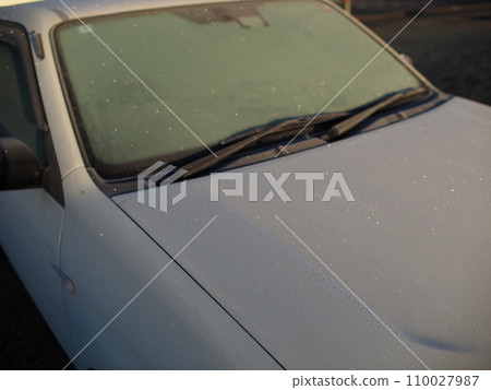 Frost has formed on the windshield of the car Frost has formed on the windshield of the car 110027987