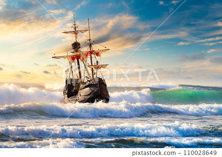 Grand view of an old sailing ship from the times of pirates on the high seas with big waves 110028649
