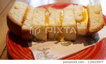 Srikaya toast or Coconut jam bread toast, popular dessert from Malaysians, Indonesians and Singaporeans, a toast bread with kaya jam is a sweet spread made from a base of coconut milk, eggs and sugar. Srikaya toast or Coconut jam bread toast, popular dessert from Malaysians, Indonesians and Singaporeans, a toast bread with kaya jam is a sweet spread made from a base of coconut milk, eggs and sugar. 110028977