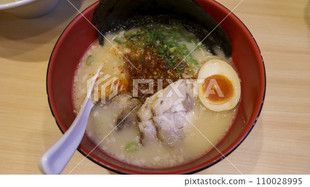 Modern style ramen with tonkotsu broth served with thin noodle, pork belly, and spring onions, special spicy miso with ground pork and fragrant garlic oil add kick to tenses. Modern style ramen with tonkotsu broth served with thin noodle, pork belly, and spring onions, special spicy miso with ground pork and fragrant garlic oil add kick to tenses. 110028995