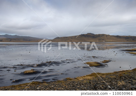 Lake and mountains, Dyrholaey, south Iceland 110030961