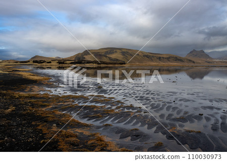Lake and mountains, Dyrholaey, south Iceland 110030973