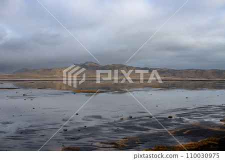 Lake and mountains, Dyrholaey, south Iceland Lake and mountains, Dyrholaey, south Iceland 110030975