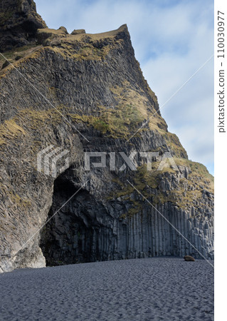 Mountain with a cave, Vik, south Iceland Mountain with a cave, Vik, south Iceland 110030977
