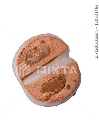 Delicious sweet mochi dessert with toppings on a dark concrete background Delicious sweet mochi dessert with toppings on a dark concrete background 110031468