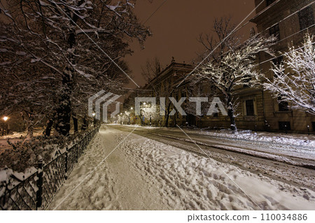 Night winter empty road in the city of Krakow. 110034886