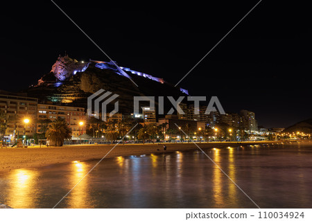 View of the beautifully illuminated Santa Barbara Castle from the sea at night. View of the beautifully illuminated Santa Barbara Castle from the sea at night. 110034924