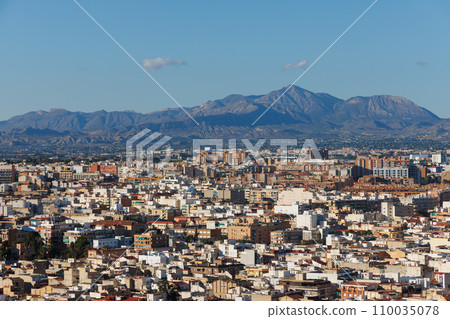 City in Spain near the mountains. 110035078