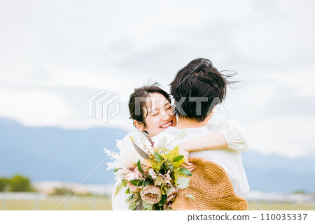 Image of a casual wedding, couple, lover, couple in the grassland Image of a casual wedding, couple, lover, couple in the grassland 110035337
