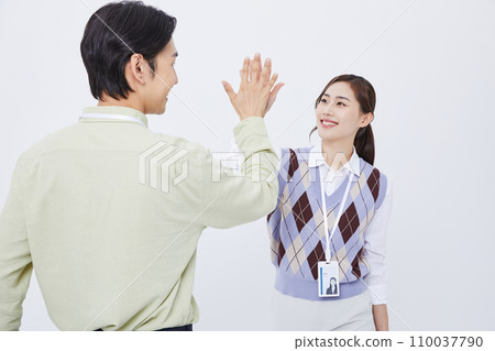 collaborative business high-five male and female photo 110037790