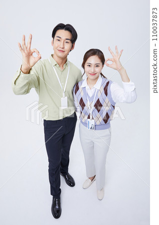 fighting business photo image of young people moving their hands okay sign 110037873