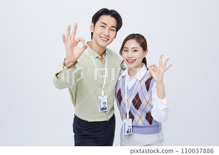 collaborative business man and woman photo okay sign 110037886