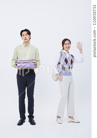 man holding a lot of documents and a woman leaving work laughing 110038732