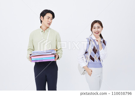 man holding a lot of documents and a woman leaving work laughing man holding a lot of documents and a woman leaving work laughing 110038796