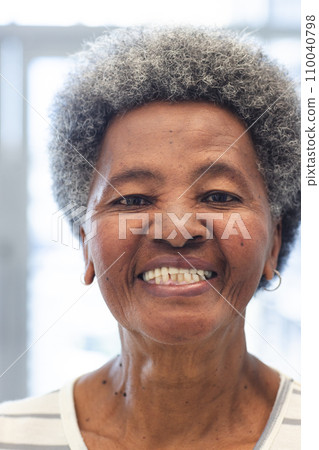 Portrait of happy african american senior woman in hospital Portrait of happy african american senior woman in hospital 110040798