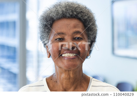 Portrait of happy african american senior woman in hospital Portrait of happy african american senior woman in hospital 110040829