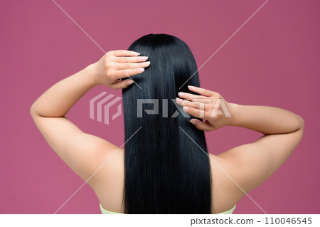 beautiful straight hair isolated on pink background beautiful straight hair isolated on pink background 110046545