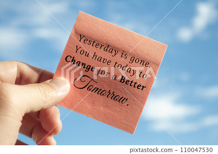Motivational quote about yesterday is gone on sticky note with sky background. Motivational concept. Motivational quote about yesterday is gone on sticky note with sky background. Motivational concept. 110047530