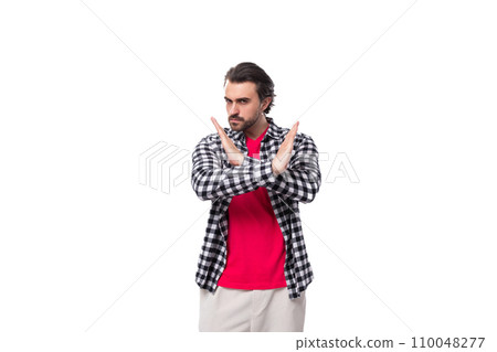 young smart brunette caucasian man with stylish hairstyle and beard wants to show stop and cross young smart brunette caucasian man with stylish hairstyle and beard wants to show stop and cross 110048277