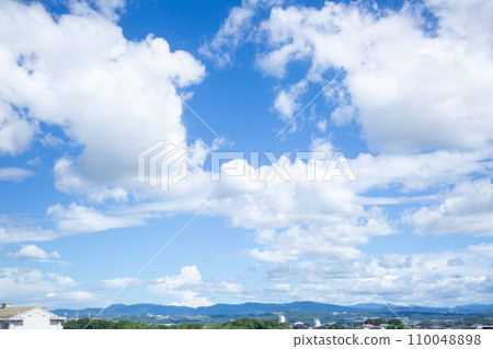 Blue sky and clouds and mountains Blue sky and clouds and mountains 110048898