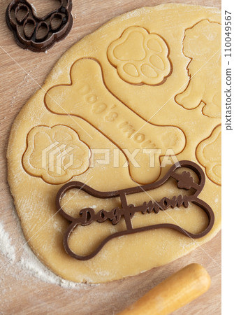 Preparing homemade healthy dog treats. Preparing homemade healthy dog treats. 110049567