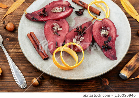 Sweet poached pears in red wine Sweet poached pears in red wine 110050946