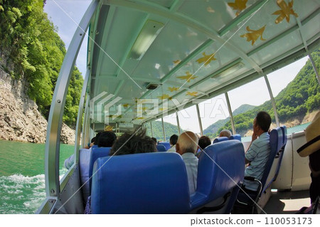 Inside the amphibious bus navigating Lake Yashio at Kawaji Dam 110053173