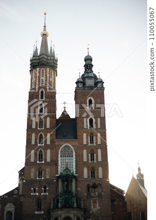 St. Mary's Basilica on the Krakow Main Square. Historic city of Cracow in Poland. St. Mary's Basilica on the Krakow Main Square. Historic city of Cracow in Poland. 110055067