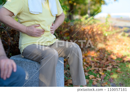 Senior female couple concerned about belly fat, bench break, walking, diet, exercise, healthy habits, walk 110057181
