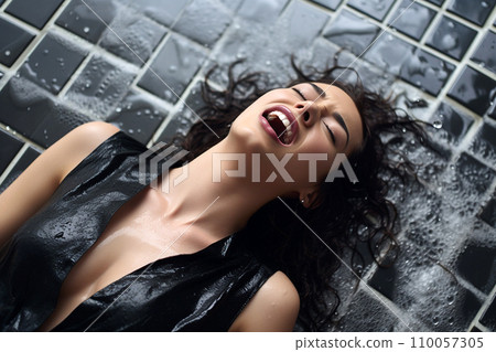 Young european woman having orgasm. Woman with open mouth and closed eyes enjoying sex lying on wet tiled floor in a shower, screaming in passion. Sexual experience, masturbation, cunnilingus. Young european woman having orgasm. Woman with open mouth and closed eyes enjoying sex lying on wet tiled floor in a shower, screaming in passion. Sexual experience, masturbation, cunnilingus. 110057305