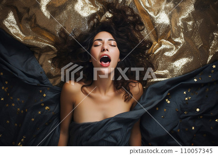 Young european woman having orgasm. Woman with open mouth and closed eyes enjoying sex lying among flying glitter and sparkles as a symbol of orgasm. Sexual experience, masturbation, cunnilingus. Young european woman having orgasm. Woman with open mouth and closed eyes enjoying sex lying among flying glitter and sparkles as a symbol of orgasm. Sexual experience, masturbation, cunnilingus. 110057345