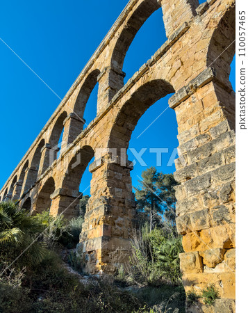 Roman aqueduct Devils Bridge at Sunset. Tarragona, Catalonia, Spain. 110057465