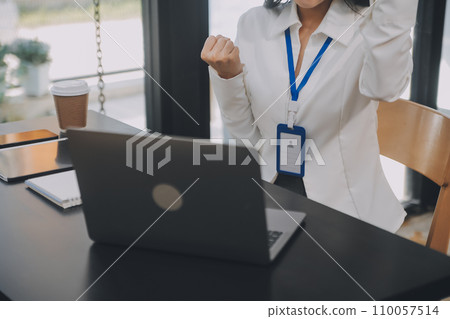 Entrepreneur Asian businessman and businesswoman discussing new business project in tablet in modern Meeting In Modern Office, Asian business casual concept. 110057514