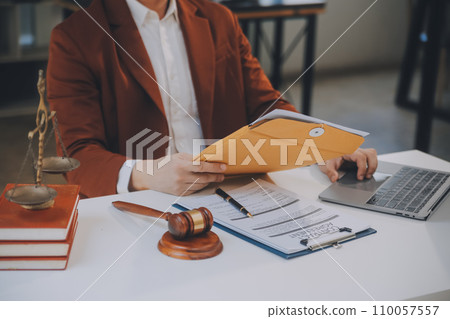 Lawyer, legal advisor, businessman brainstorming information on agreement details Business contracts in legal processing books for accuracy in contract documents. joint financial investment. Lawyer, legal advisor, businessman brainstorming information on agreement details Business contracts in legal processing books for accuracy in contract documents. joint financial investment. 110057557