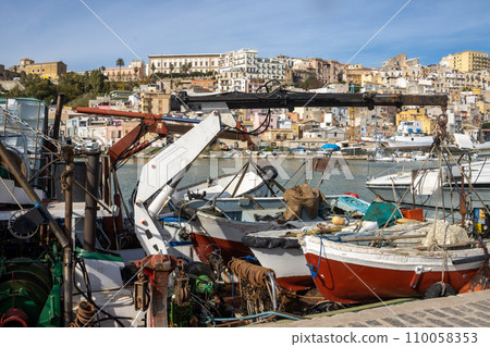 Harbor with fishing boats and city Sciacca, Sicily 110058353