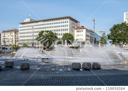 The Stachus or Karlsplatz in the center of Munich, Germany with opulent water features 110058384