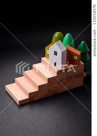 A small wooden house as an idea for investing in your own home A small wooden house as an idea for investing in your own home 110058476
